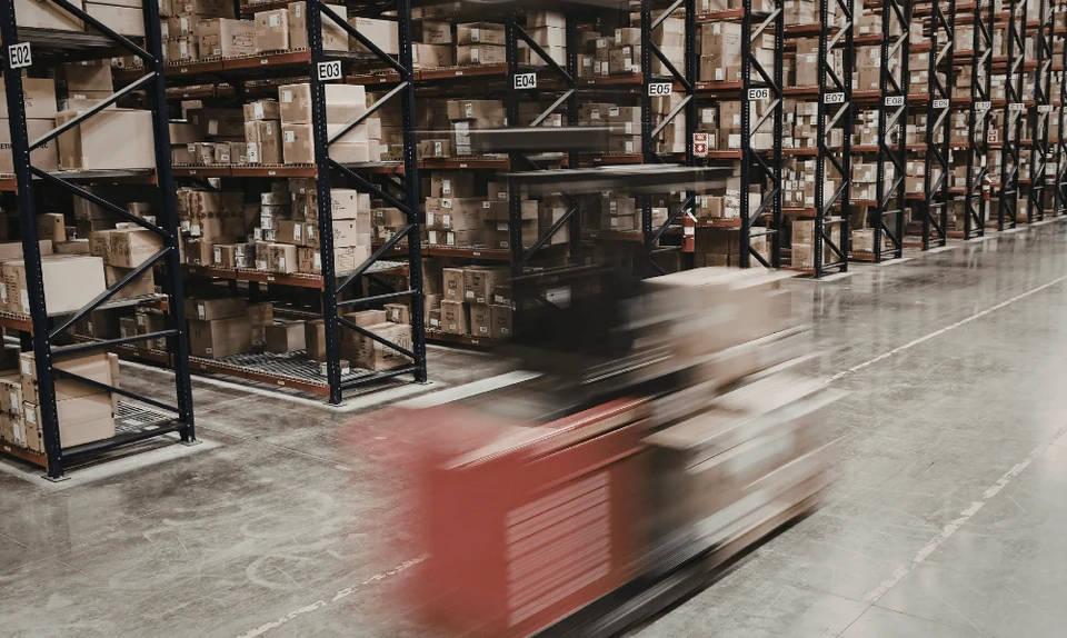 Warehouse storage aisles and material handling equipment