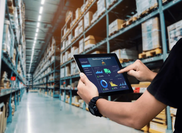 Warehouse operator using a tablet — existing SMERP website image